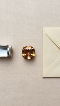Unheated spinel gemstone with branded loupe